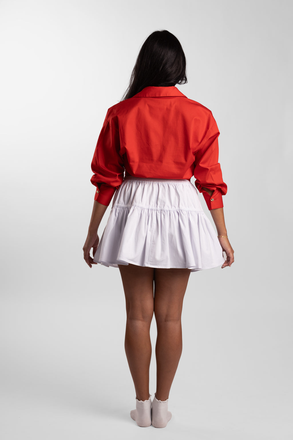 COURTSIDE RUFFLE SKIRT